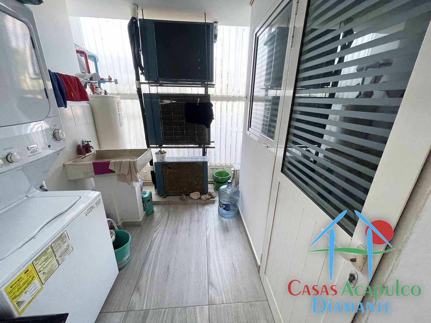 Maralago C 202 - Lavandería y cuarto de servicio antes de Otis 2